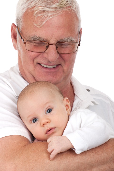 man holding infant
